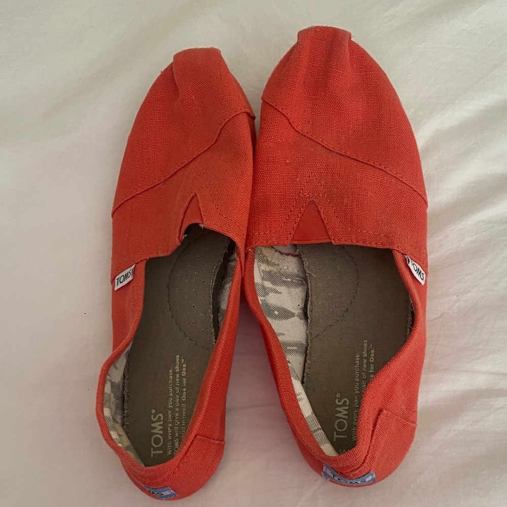 TOMS Vibrant Orange Canvas Slip-Ons